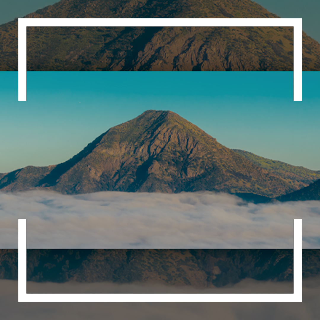 "Guardián Rocoso en Mar de Calma: Luz de Primavera Sobre Cerro Manquehue" - Imagen 1